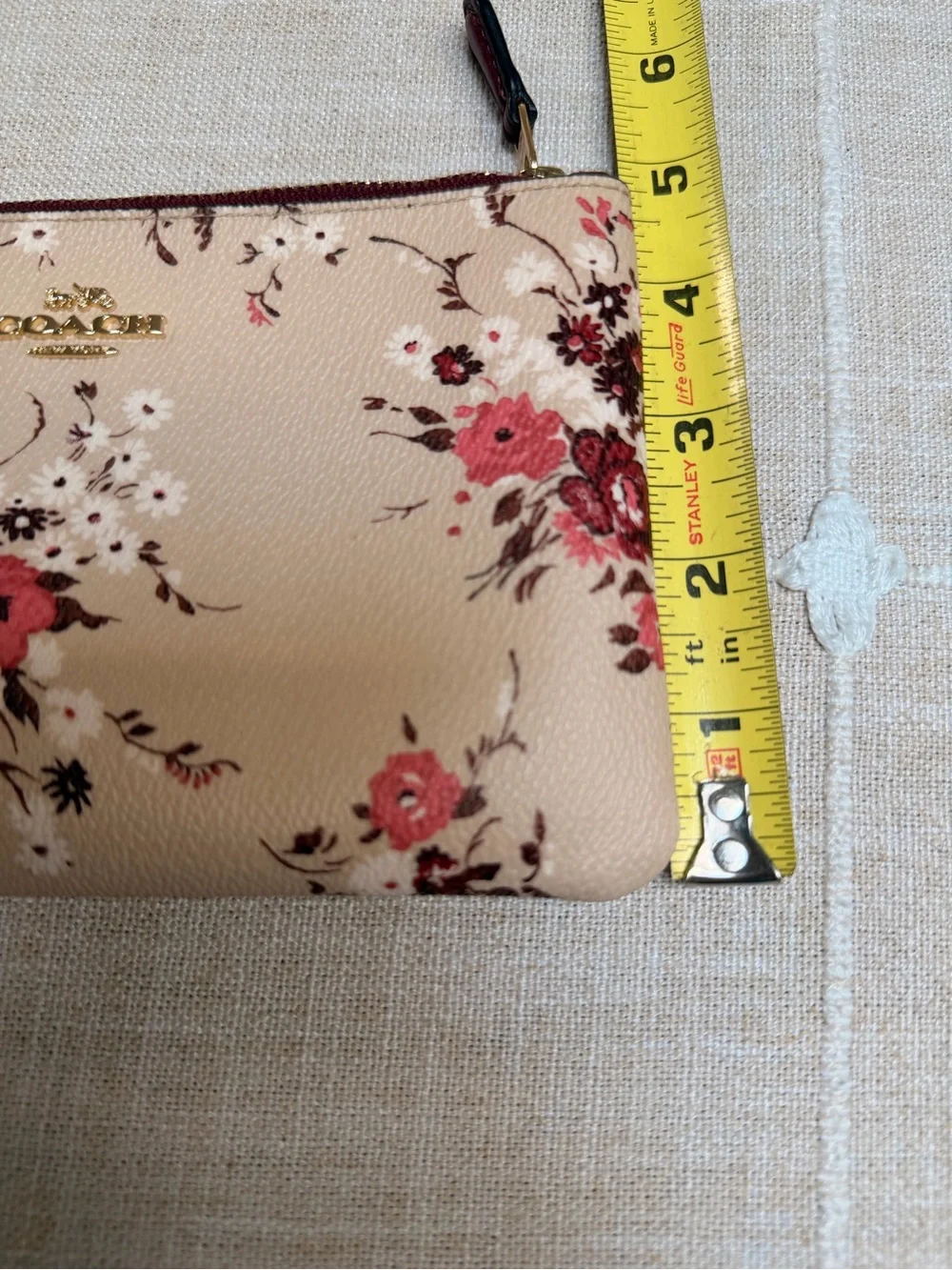 Coach Beige Floral Wristlet with Burgundy Trim